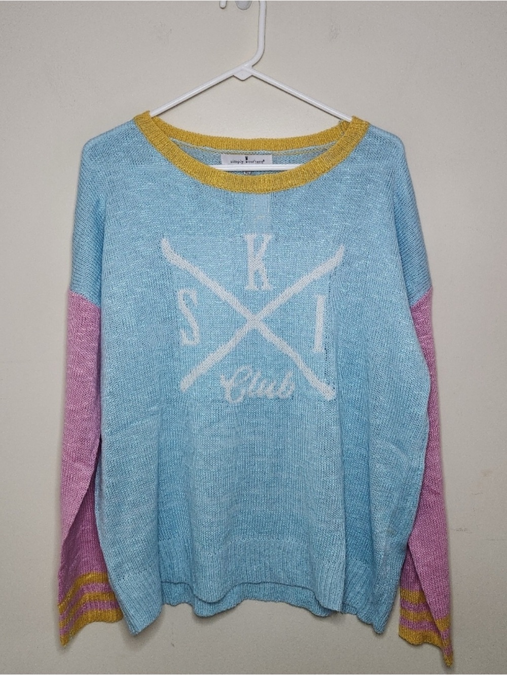 Simply Southern Sky Blue Crewneck Sweater with Pink Sleeves and Yellow Trim